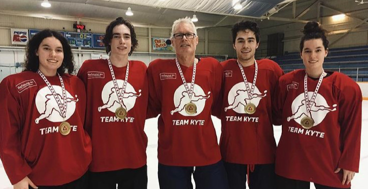 Kyte family wearing Team Kyte jerseys